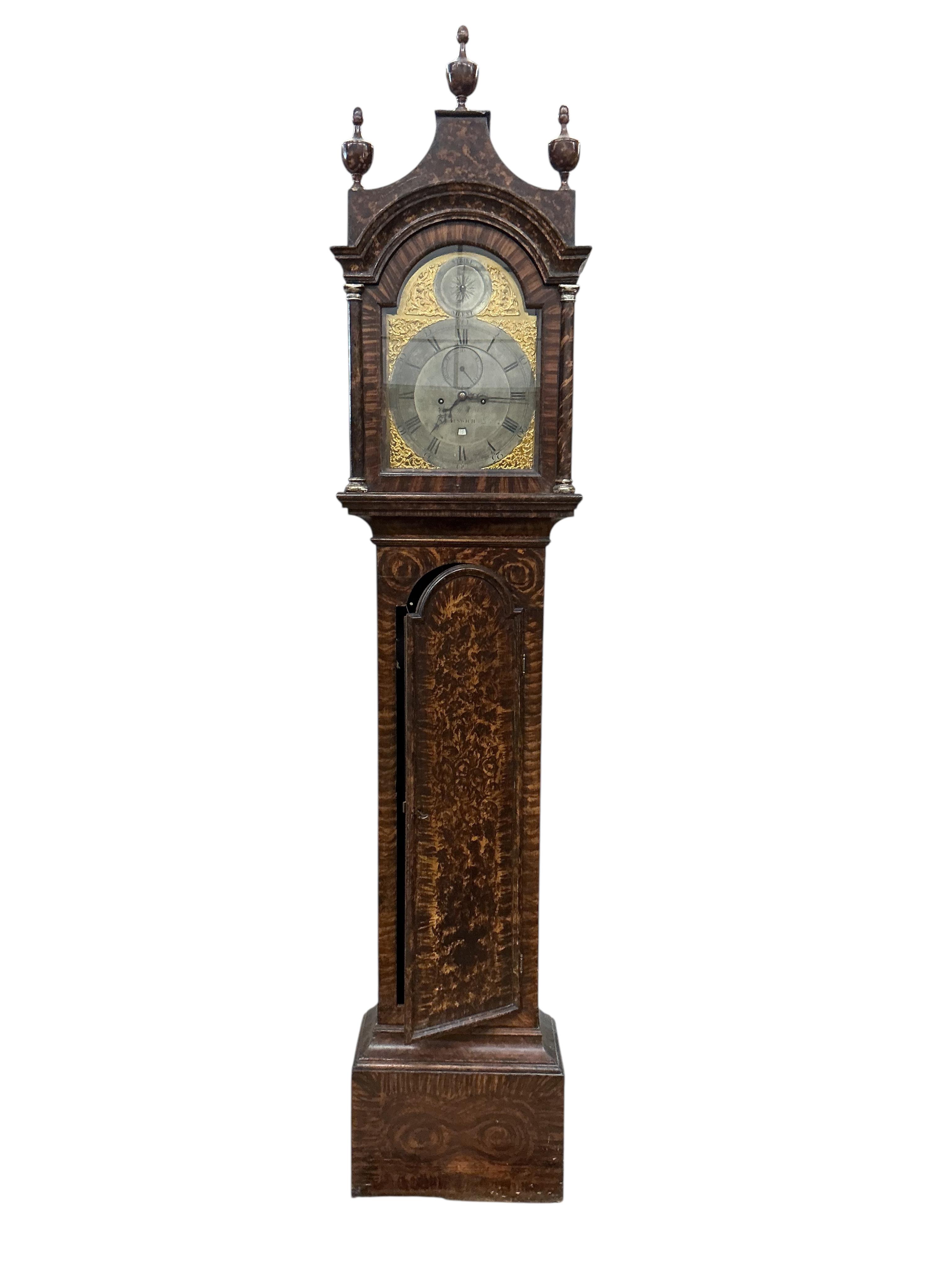 A George III simulated mulberry eight day longcase clock, the arched brass dial with strike silent and subsidiary seconds dial, date aperture, signed Moore, Ipswich, height 240cm